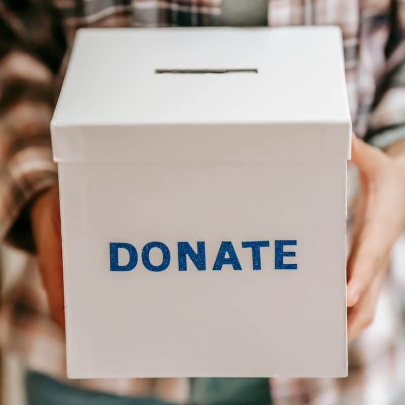 White donation box, symbolizing HOPE For Prisoners monthly donations for prisoners